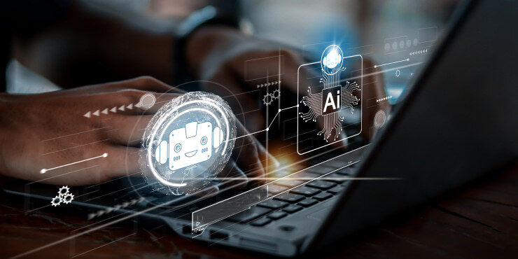 Hands on laptop with AI and analytics graphics